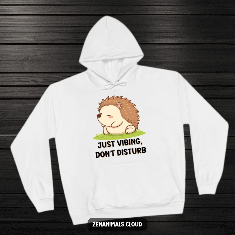 Funny hoodie featuring a content hedgehog rolling on its back, designed for ultimate comfort and humorous appeal.