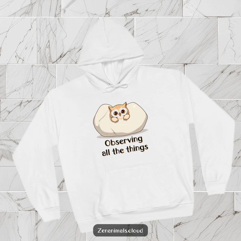 Funny Owl Hoodie: A curious owl peeking out from behind a large, smooth stone, perfect for cozy, humorous mystery.