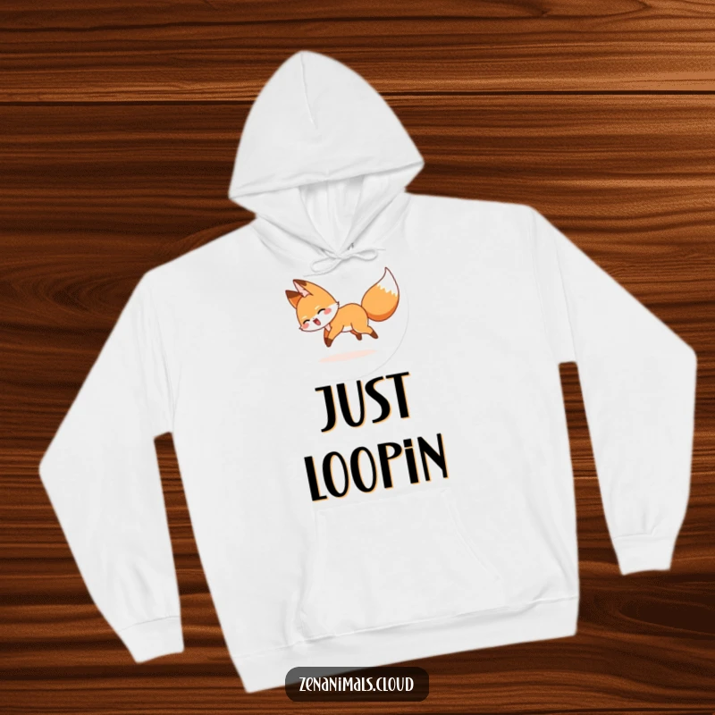 Funny hoodie showcasing a cartoon fox joyfully chasing its tail in a circular, energetic motion.