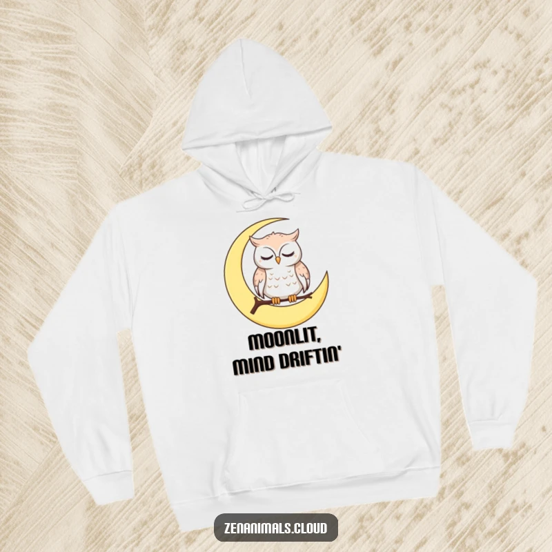 Funny Hoodie with a calm owl sitting on a crescent moon, blinking slowly, offering warmth and a humorous, sleepy vibe.